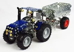 Tronico Mini New Holland T4 Met Aanhangwagen – 1 : 32 12 Tronico Mini New Holland T4 Met Aanhangwagen – 1 : 32 -Speelgoedwinkel Voor Kinderen new holland t4 met aanhanger tronico mini 10056